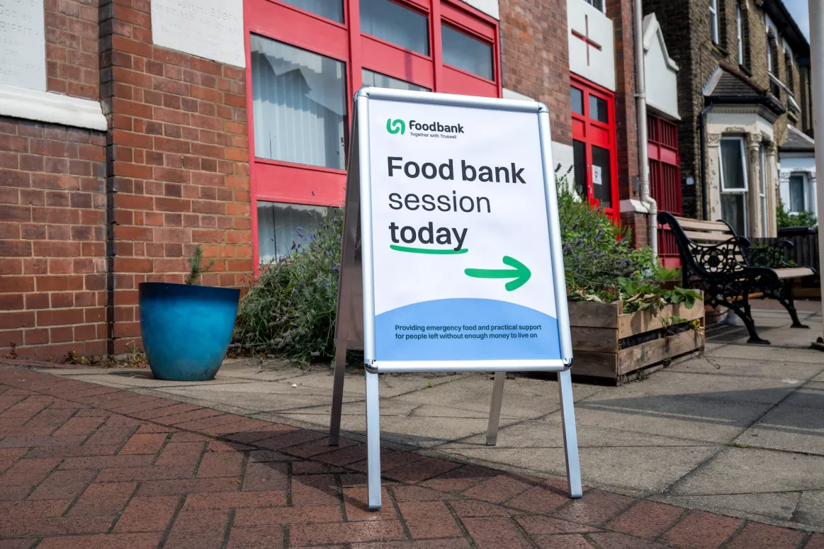 A sign outside to the entrance to the Lewisham foodbank