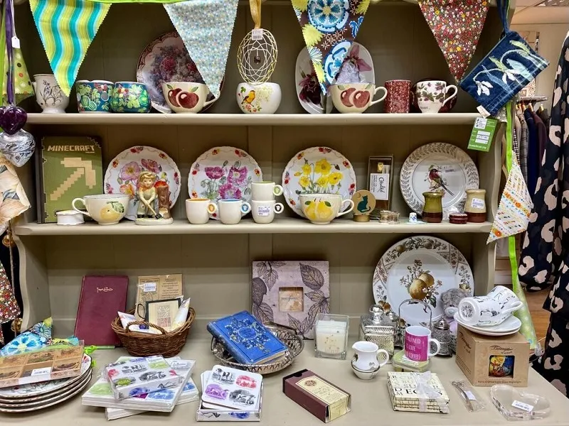 Shelves displaying items for sale at a Trussell Trust shop