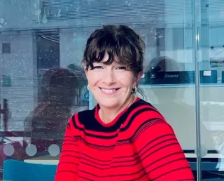 Trustee Catherine May